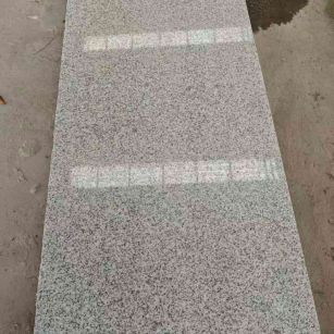 西安芝麻白光面毛板